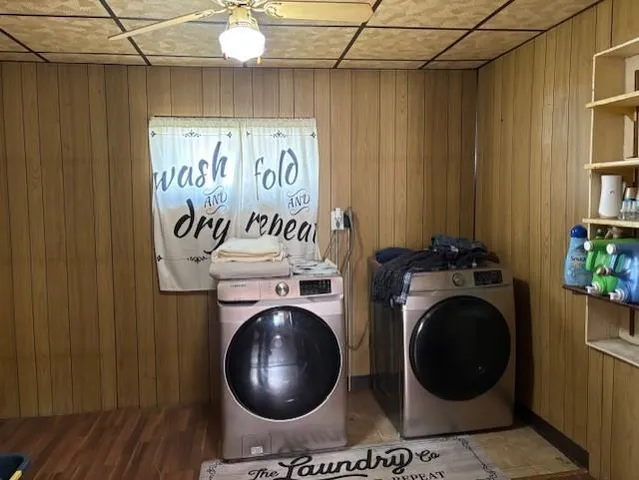 a bathroom with a washer and dryer