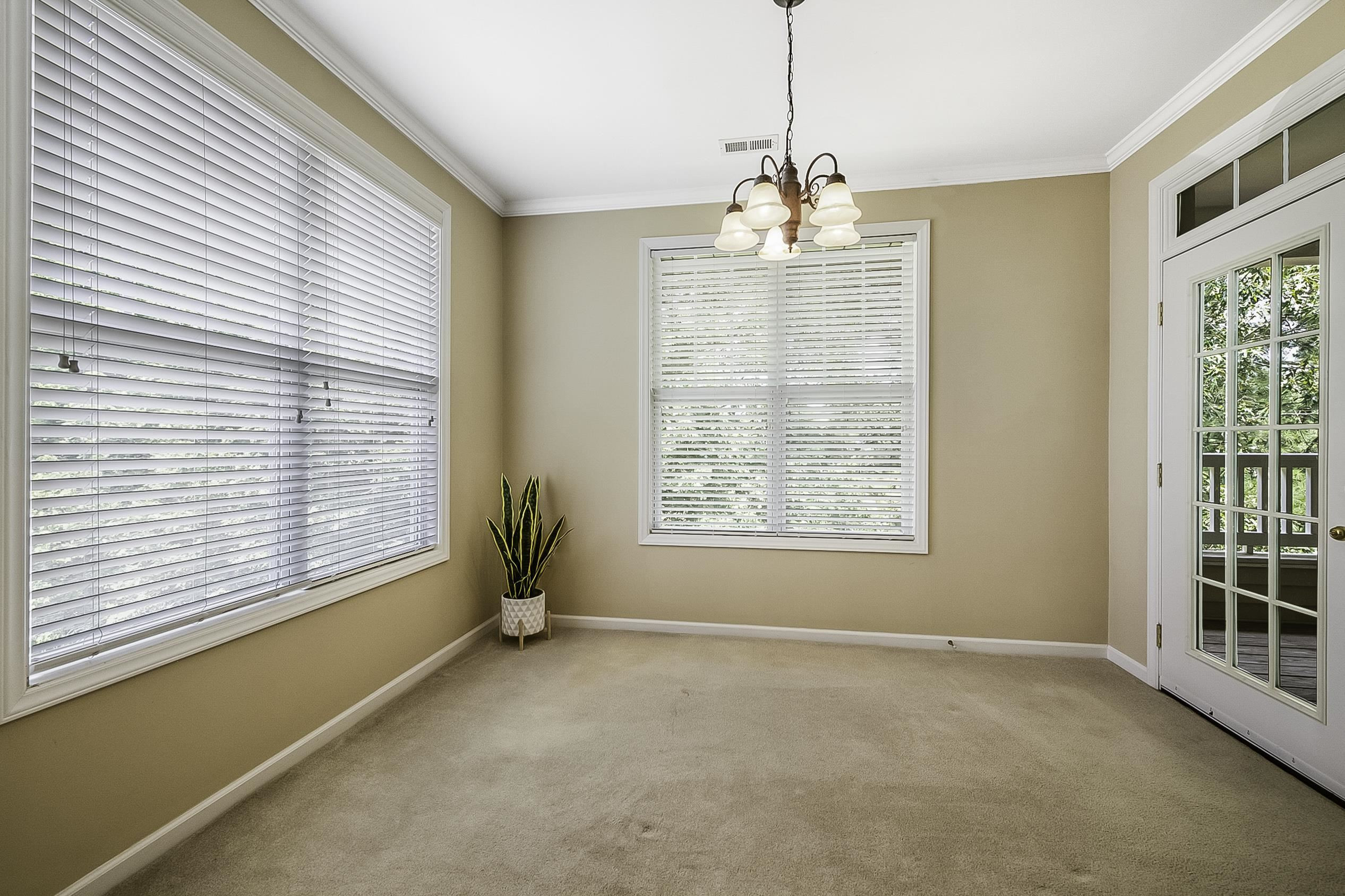 8041 Allyns Landing Way, Unit 302 Raleigh, NC 27615 - Photo 11 of 31 Dining with Access to Balcony