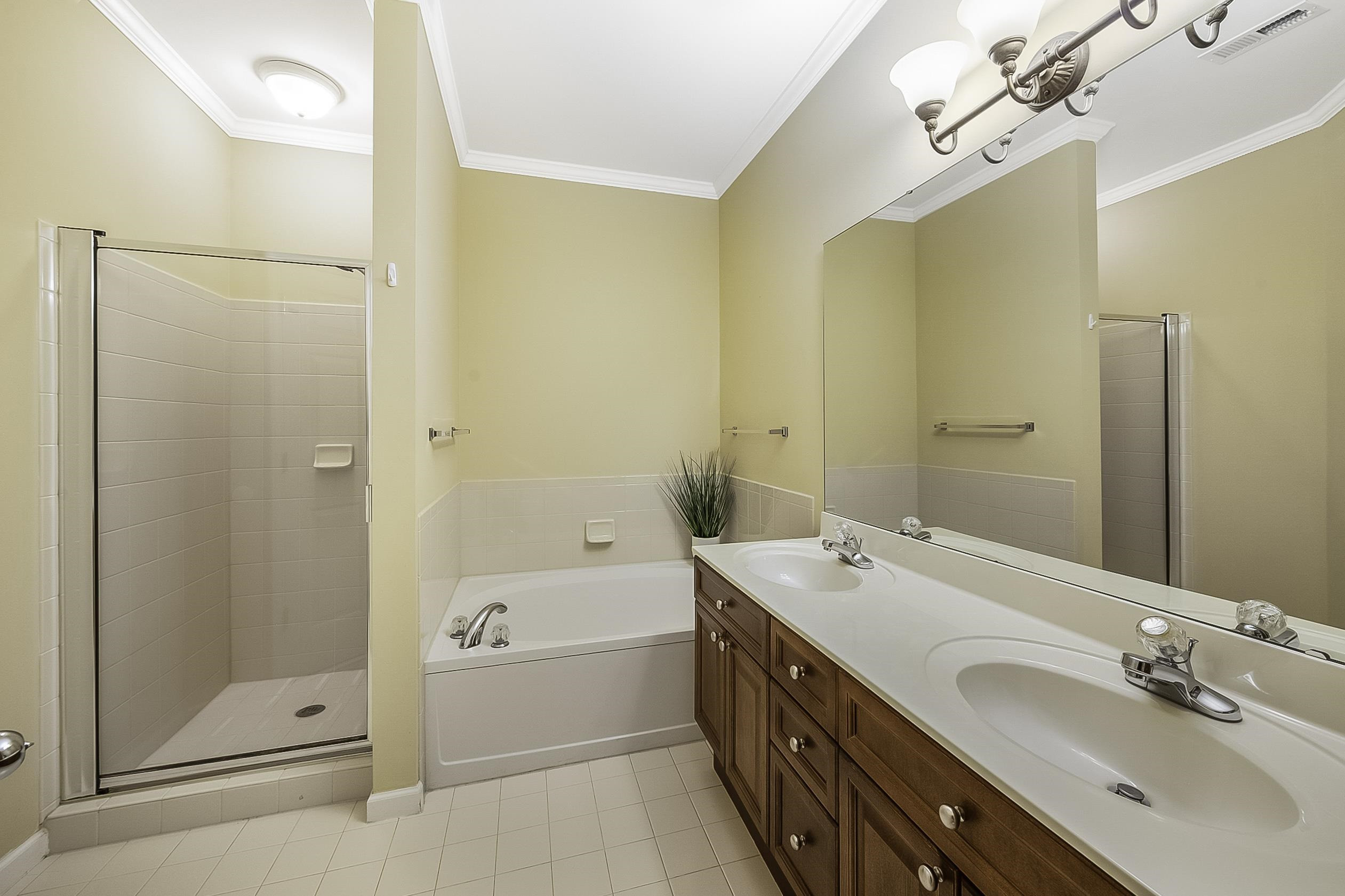 8041 Allyns Landing Way, Unit 302 Raleigh, NC 27615 - Photo 13 of 31 Double Vanity and Stand Up Shower