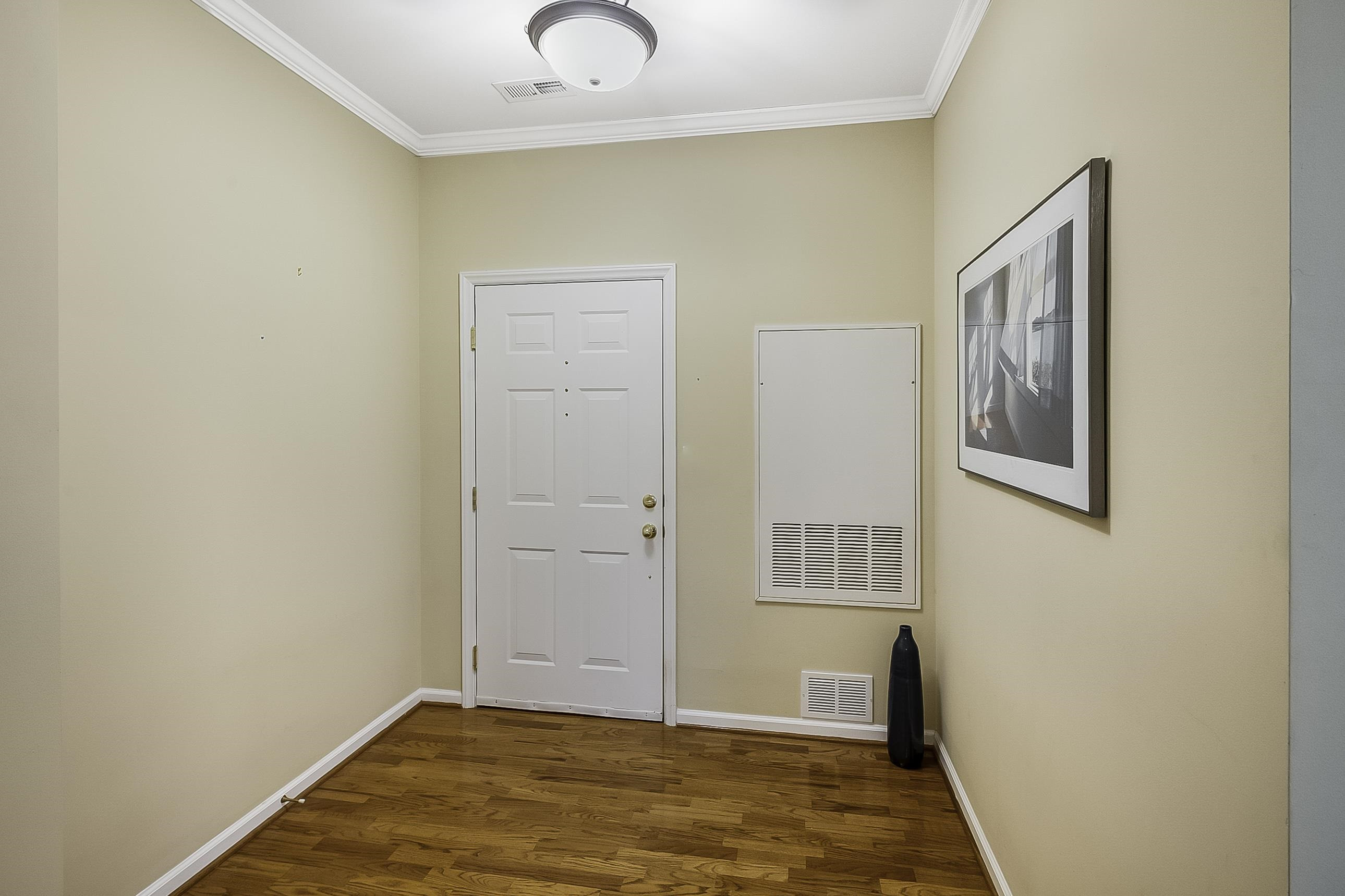 8041 Allyns Landing Way, Unit 302 Raleigh, NC 27615 - Photo 25 of 31 Entry with Gleaming Hardwoods