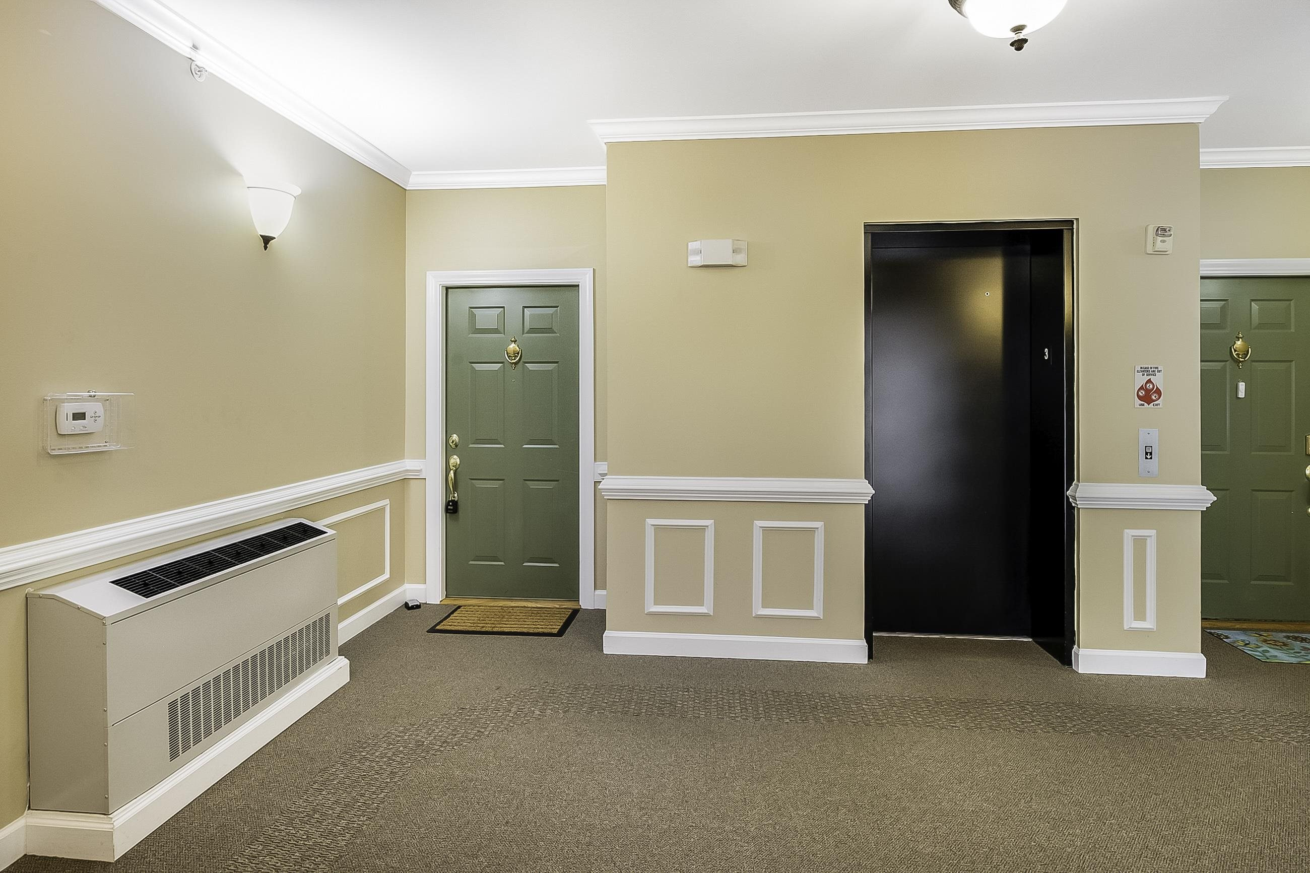 8041 Allyns Landing Way, Unit 302 Raleigh, NC 27615 - Photo 26 of 31 Door to Unit & Elevator