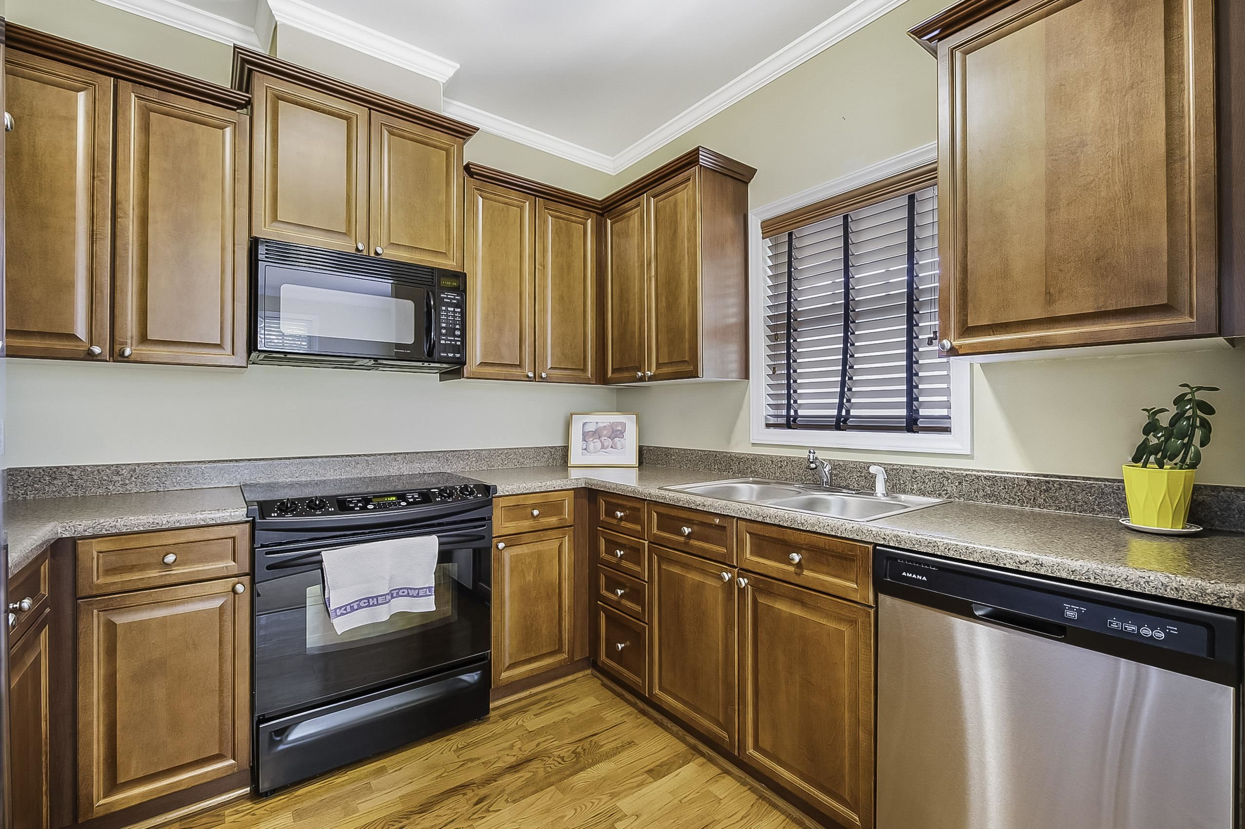 8041 Allyns Landing Way, Unit 302 Raleigh, NC 27615 - Photo 4 of 31 Chef's Kitchen with Lake Views