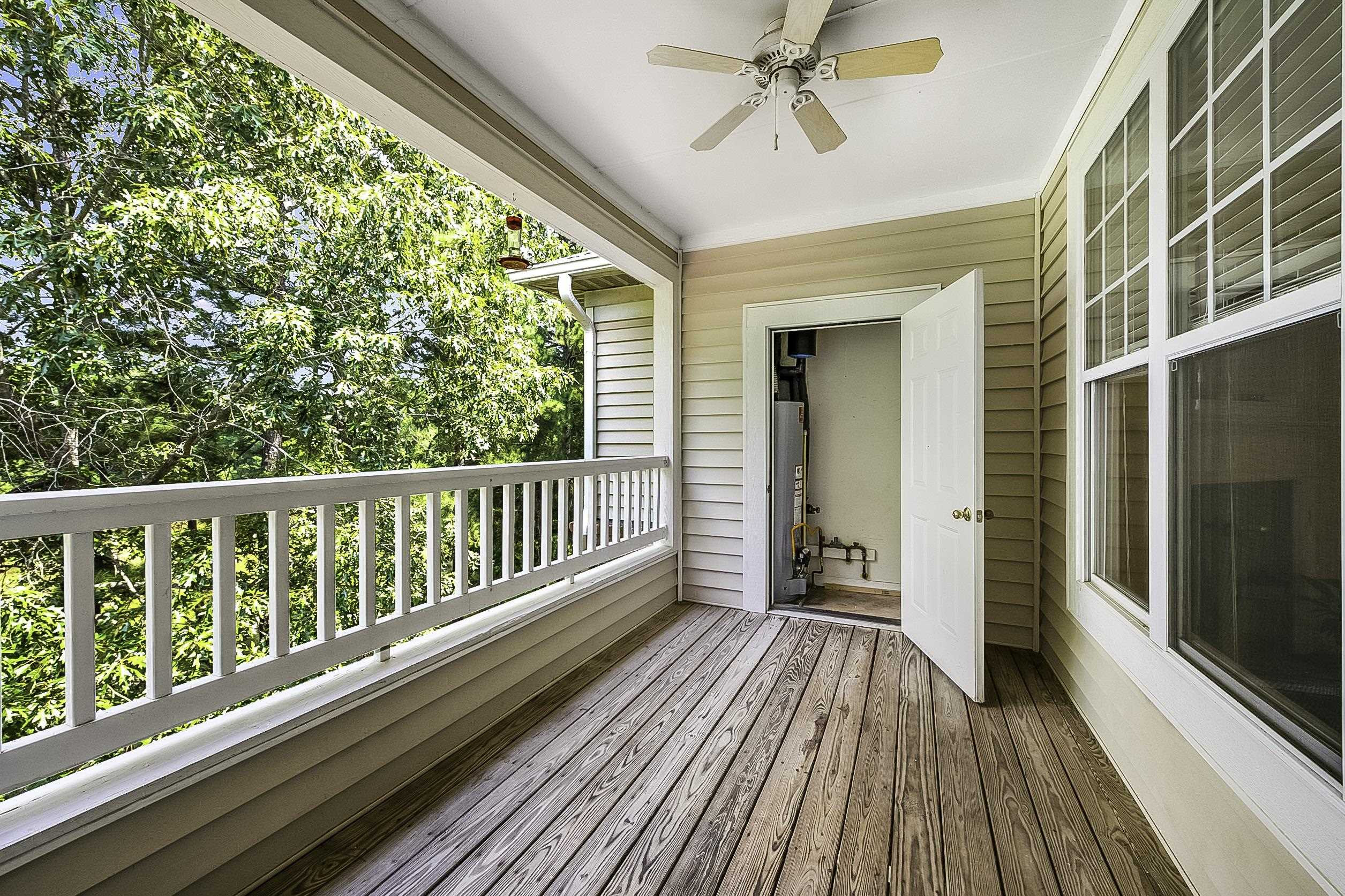 8041 Allyns Landing Way, Unit 302 Raleigh, NC 27615 - Photo 8 of 31 Balcony with Ceiling Fan and Storage