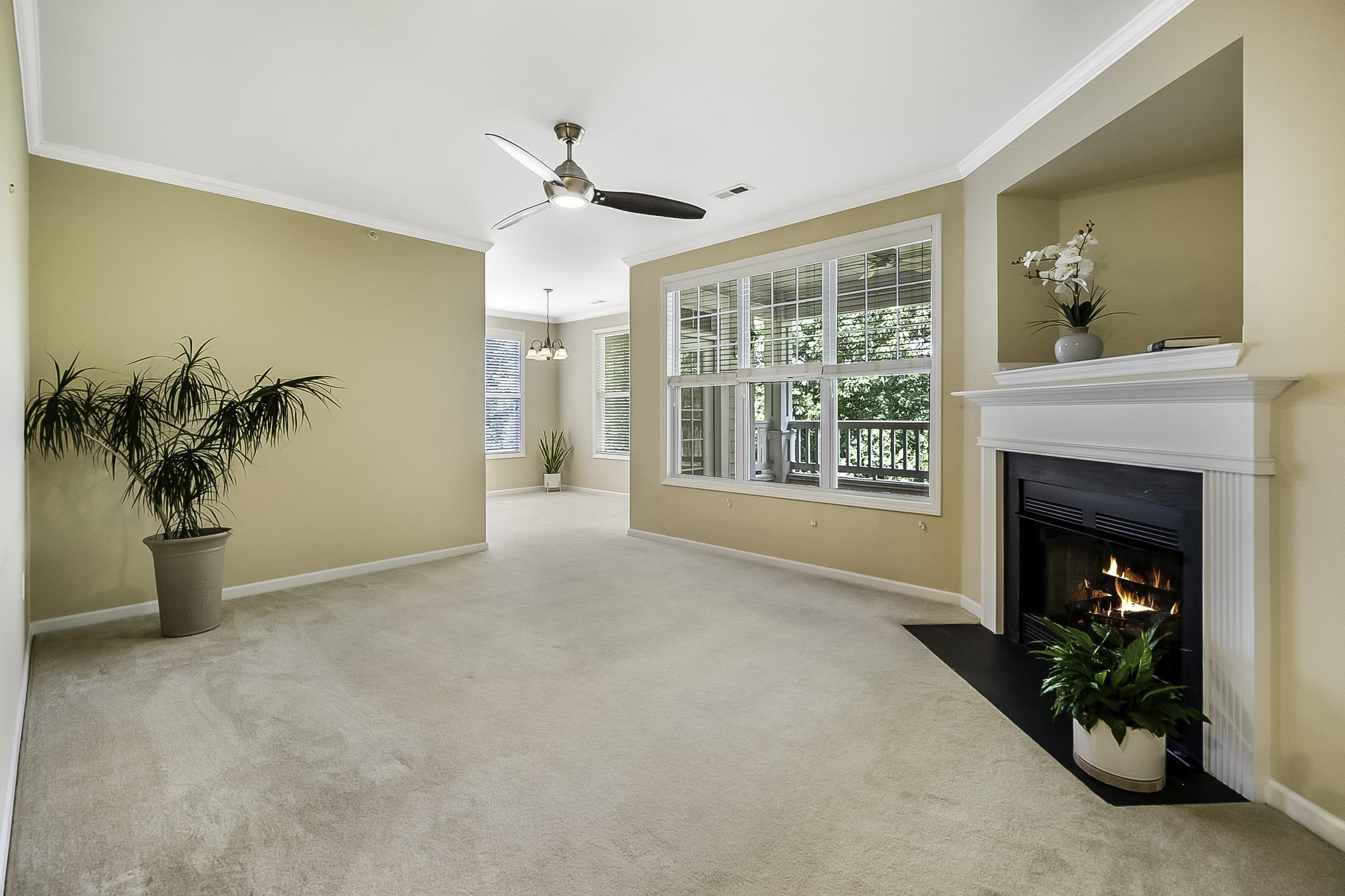 8041 Allyns Landing Way, Unit 302 Raleigh, NC 27615 - Photo 9 of 31 Open Living and Dining Space