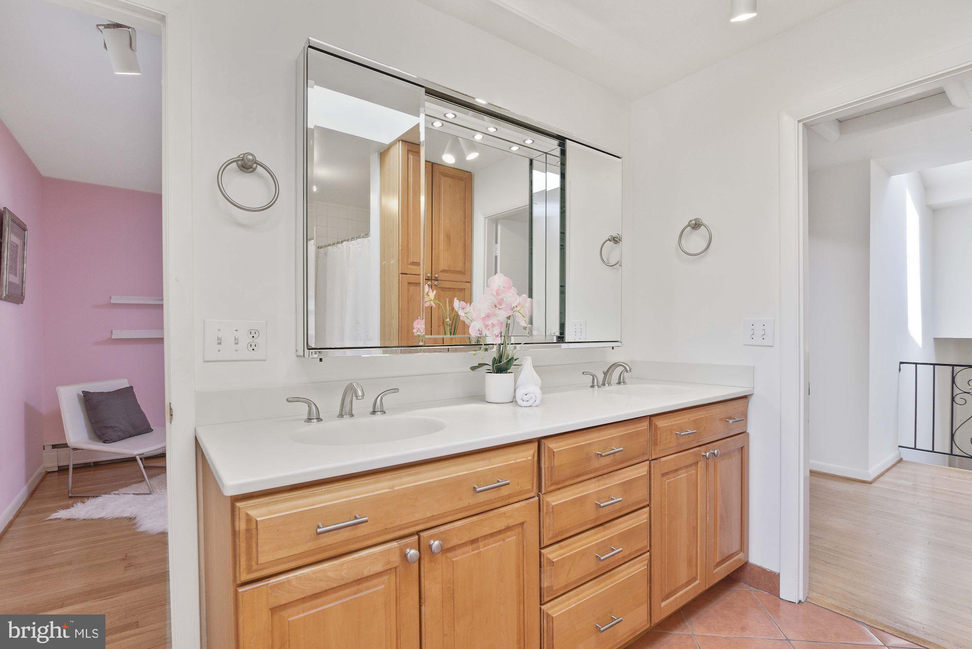7721 Brookville Road Chevy Chase, MD 20815 - Photo 14 of 30 Large renovated bath off of the owner's bedroom