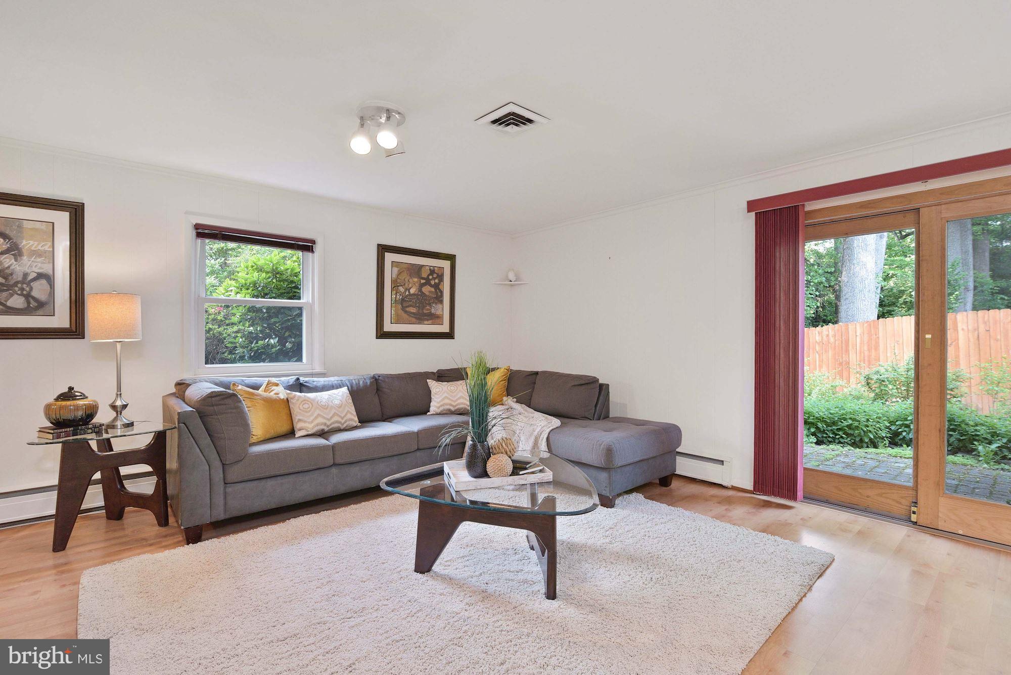 7721 Brookville Road Chevy Chase, MD 20815 - Photo 20 of 30 Family room opens onto back yard patio