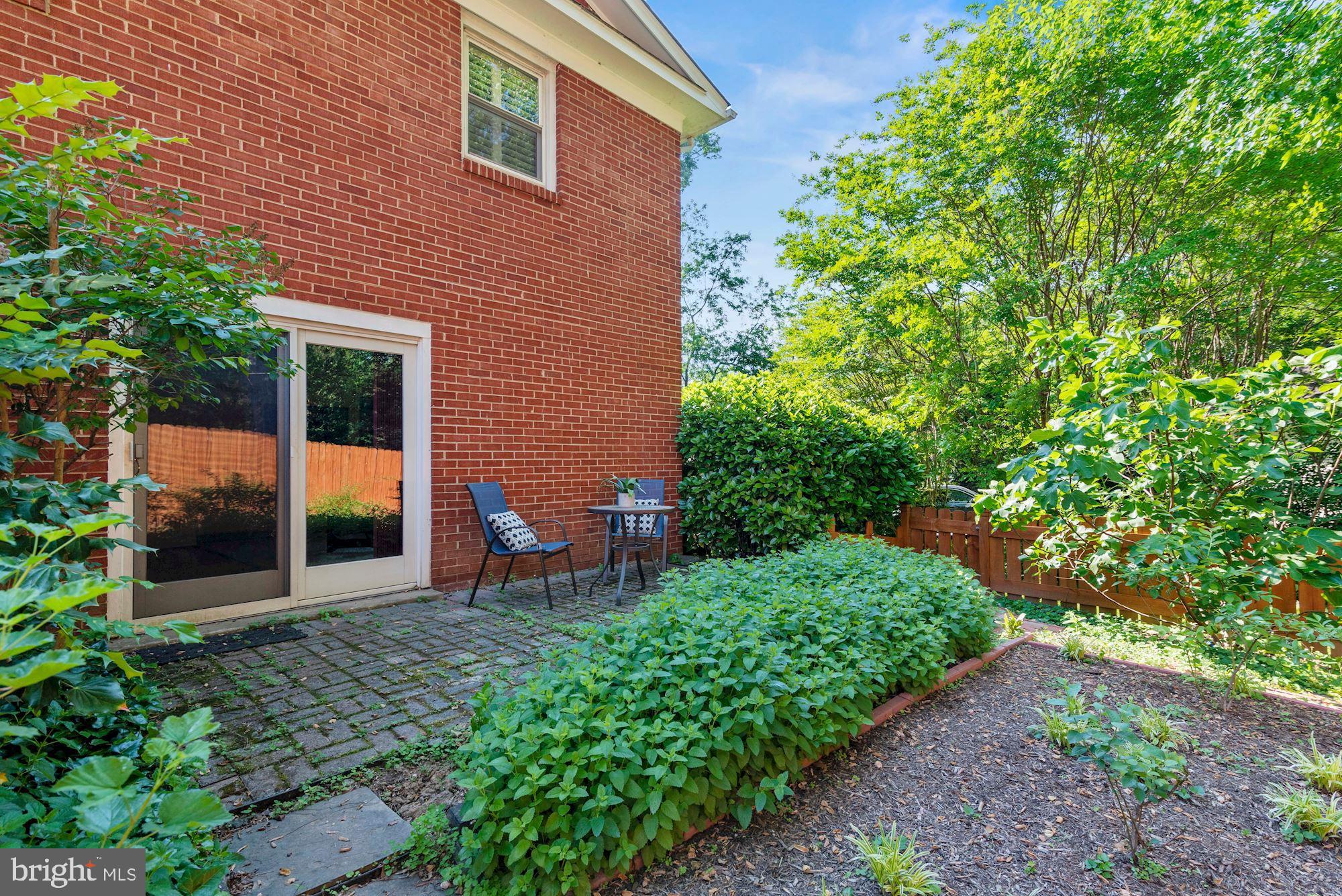 7721 Brookville Road Chevy Chase, MD 20815 - Photo 29 of 30 Peaceful rear patio overlooks the garden