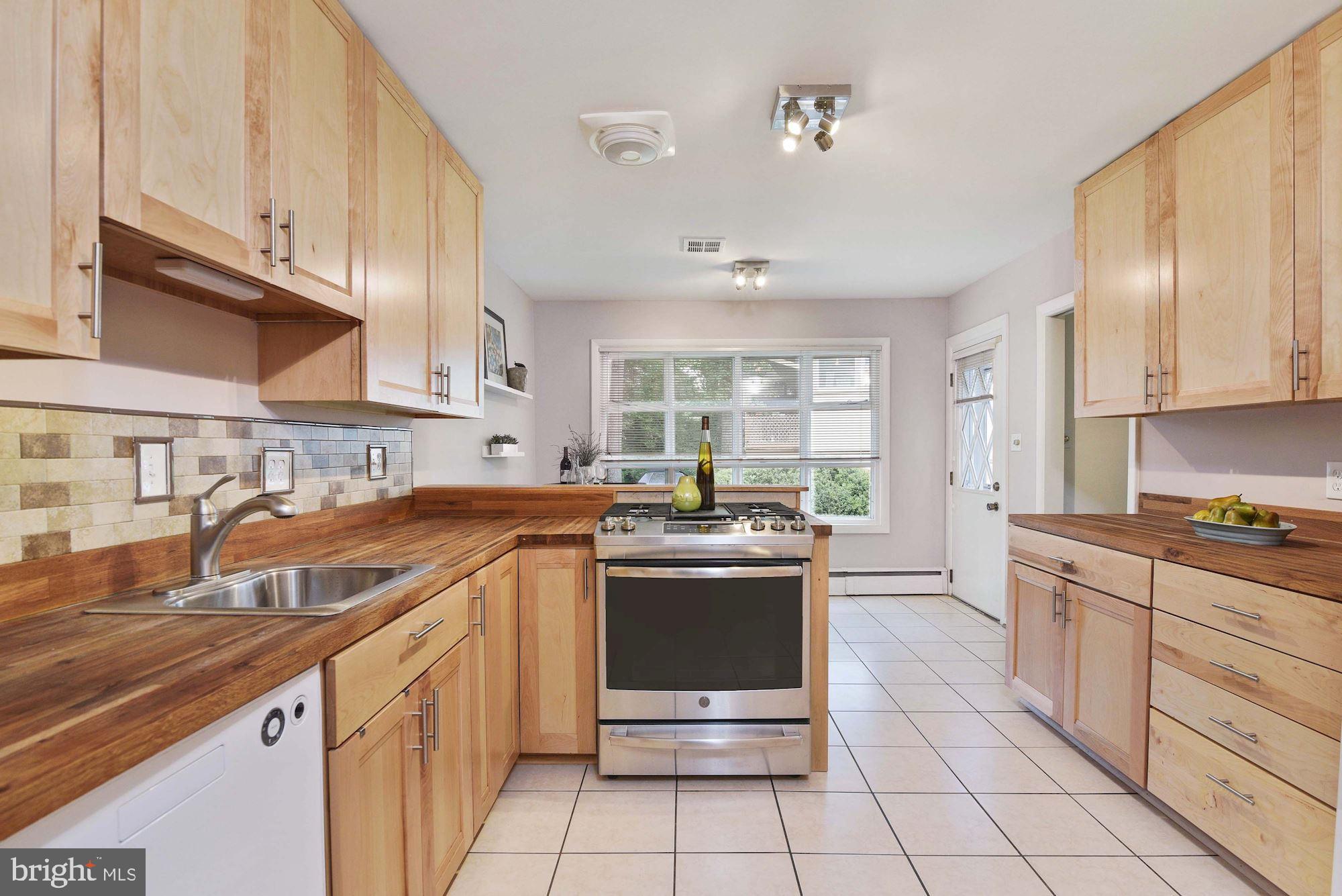 7721 Brookville Road Chevy Chase, MD 20815 - Photo 8 of 30 Spacious modern kitchen