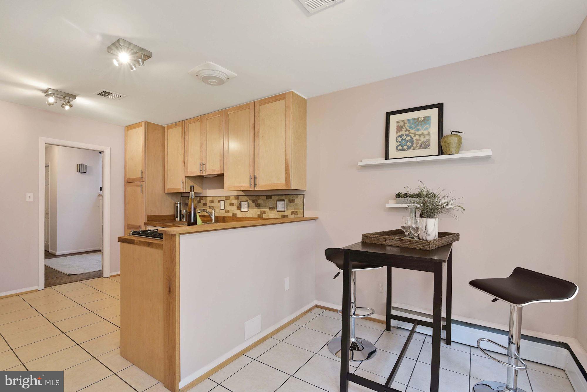 7721 Brookville Road Chevy Chase, MD 20815 - Photo 9 of 30 Table space in kitchen