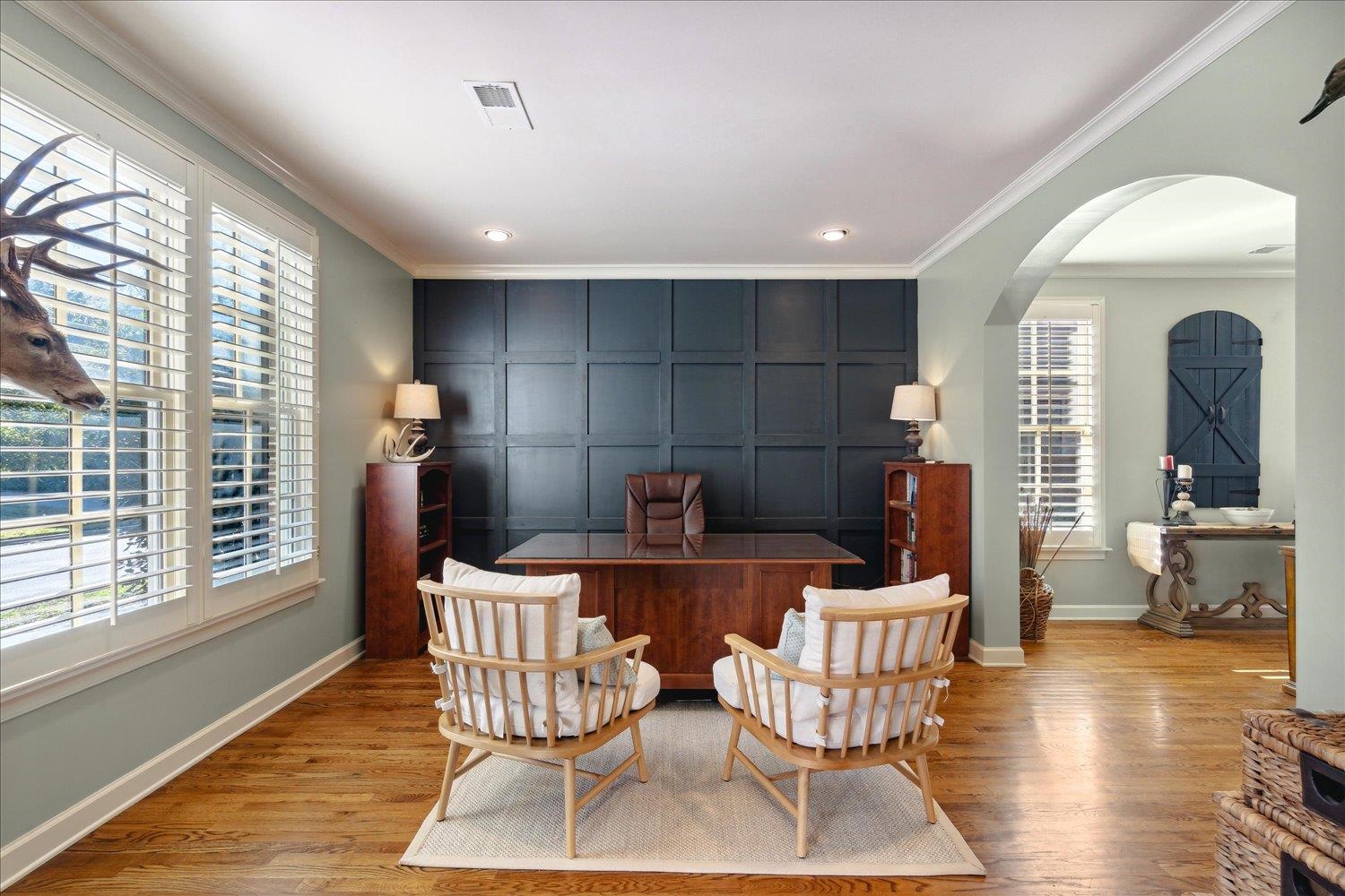 307 Colbert Street West Collierville, TN 38017 - Photo 7 of 34 Living area featuring light hardwood / wood-style flooring, a healthy amount of sunlight, and crown molding