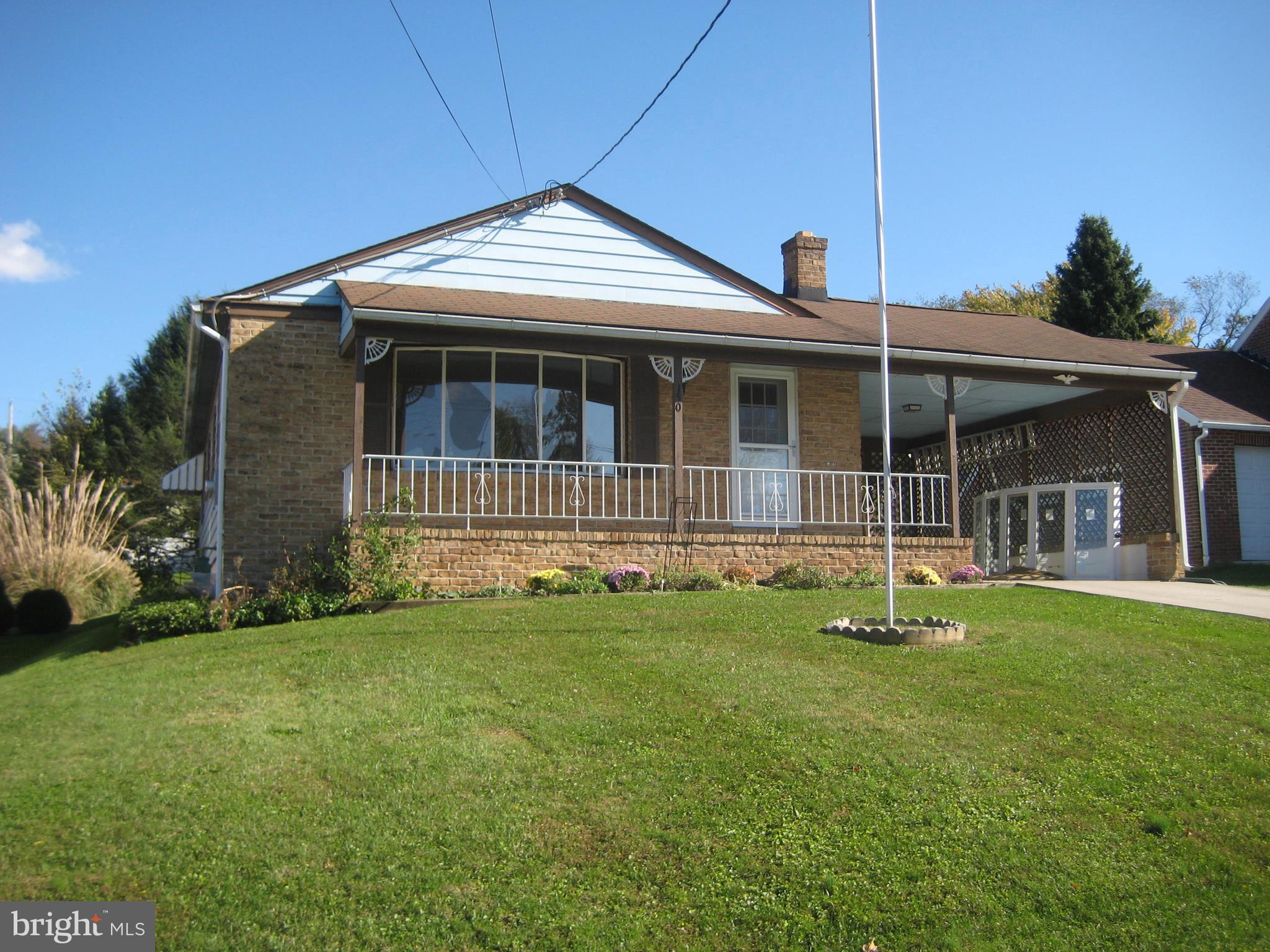 150 Sherman Street Hanover, PA 17331 - Photo 1 of 8 a front view of a house with a yard