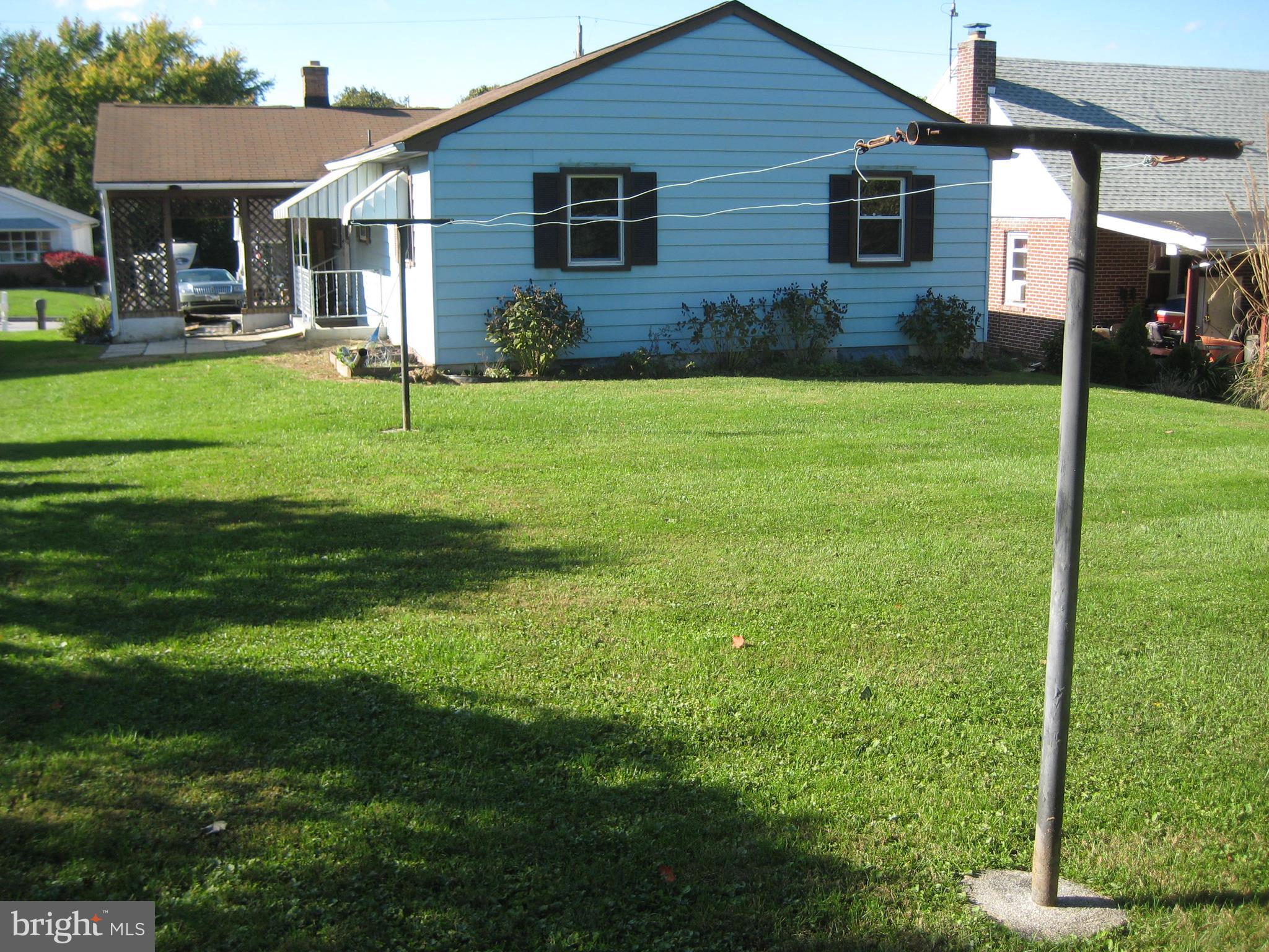 150 Sherman Street Hanover, PA 17331 - Photo 6 of 8 a front view of house with yard and green space