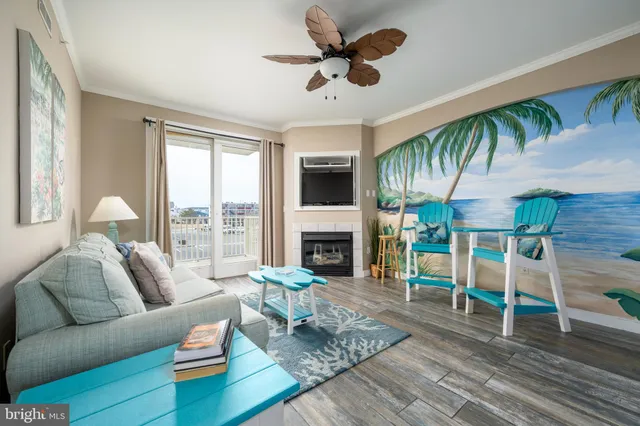 a living room with furniture fireplace and a flat screen tv