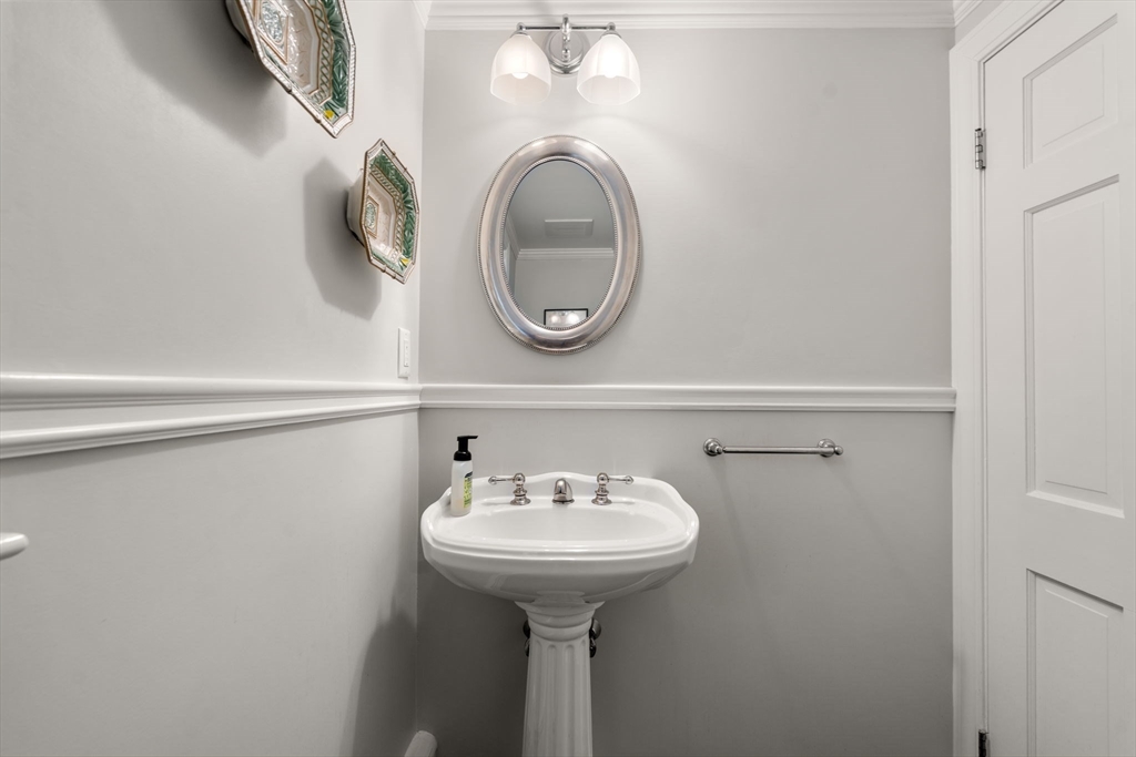 96 Elmwood Road Wellesley, MA 02481 - Photo 17 of 40 a bathroom with a sink and a mirror