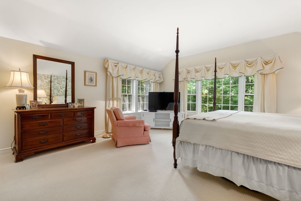 96 Elmwood Road Wellesley, MA 02481 - Photo 19 of 40 a bed room with a bed window and a dresser