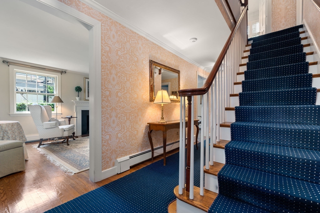 96 Elmwood Road Wellesley, MA 02481 - Photo 3 of 40 a view of entryway and hall with wooden floor