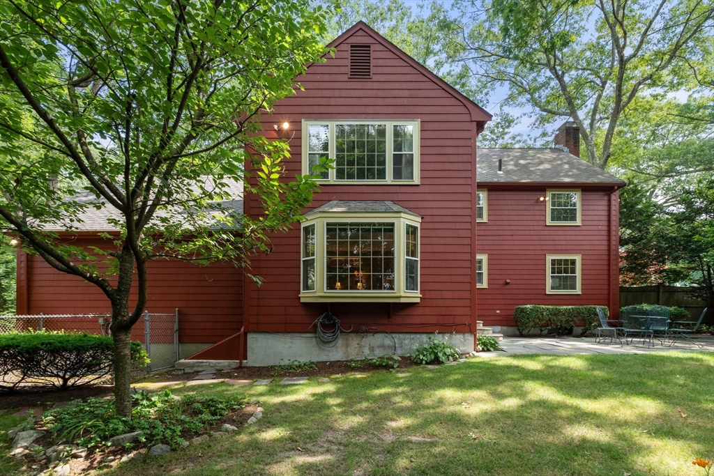 96 Elmwood Road Wellesley, MA 02481 - Photo 33 of 40 a front view of a house with a yard