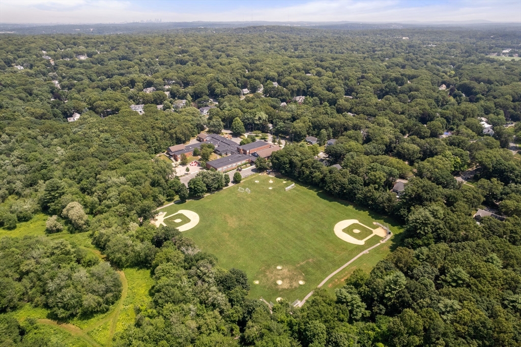 96 Elmwood Road Wellesley, MA 02481 - Photo 36 of 40 an aerial view of a residential houses with city view and green space