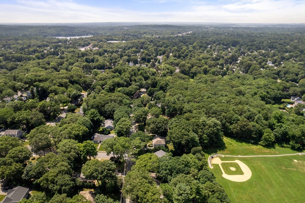 96 Elmwood Road Wellesley, MA 02481 - Photo 37 of 40 an aerial view of residential house with outdoor space and trees all around