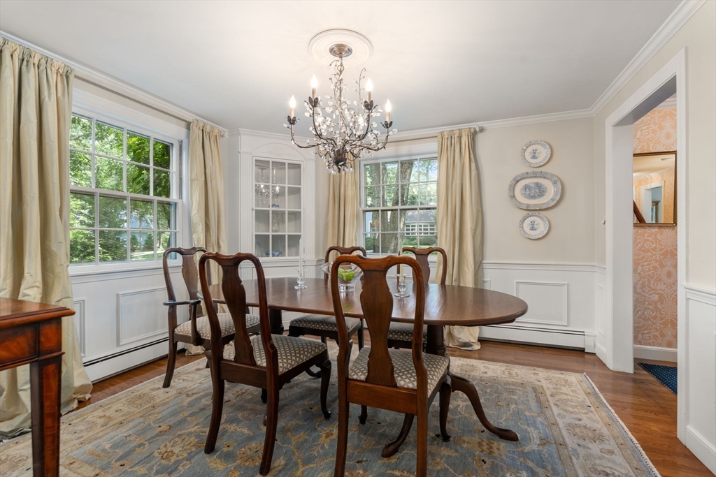 96 Elmwood Road Wellesley, MA 02481 - Photo 8 of 40 a view of a dining room with furniture window and wooden floor