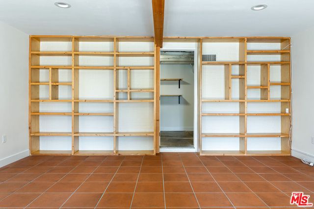 a view of a empty room with a window