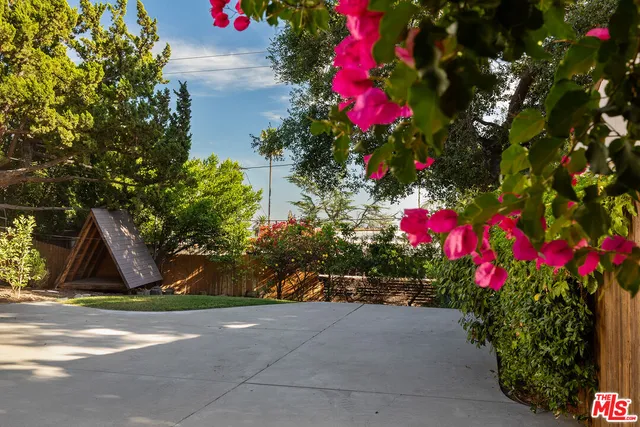 a view of a bench in a garden