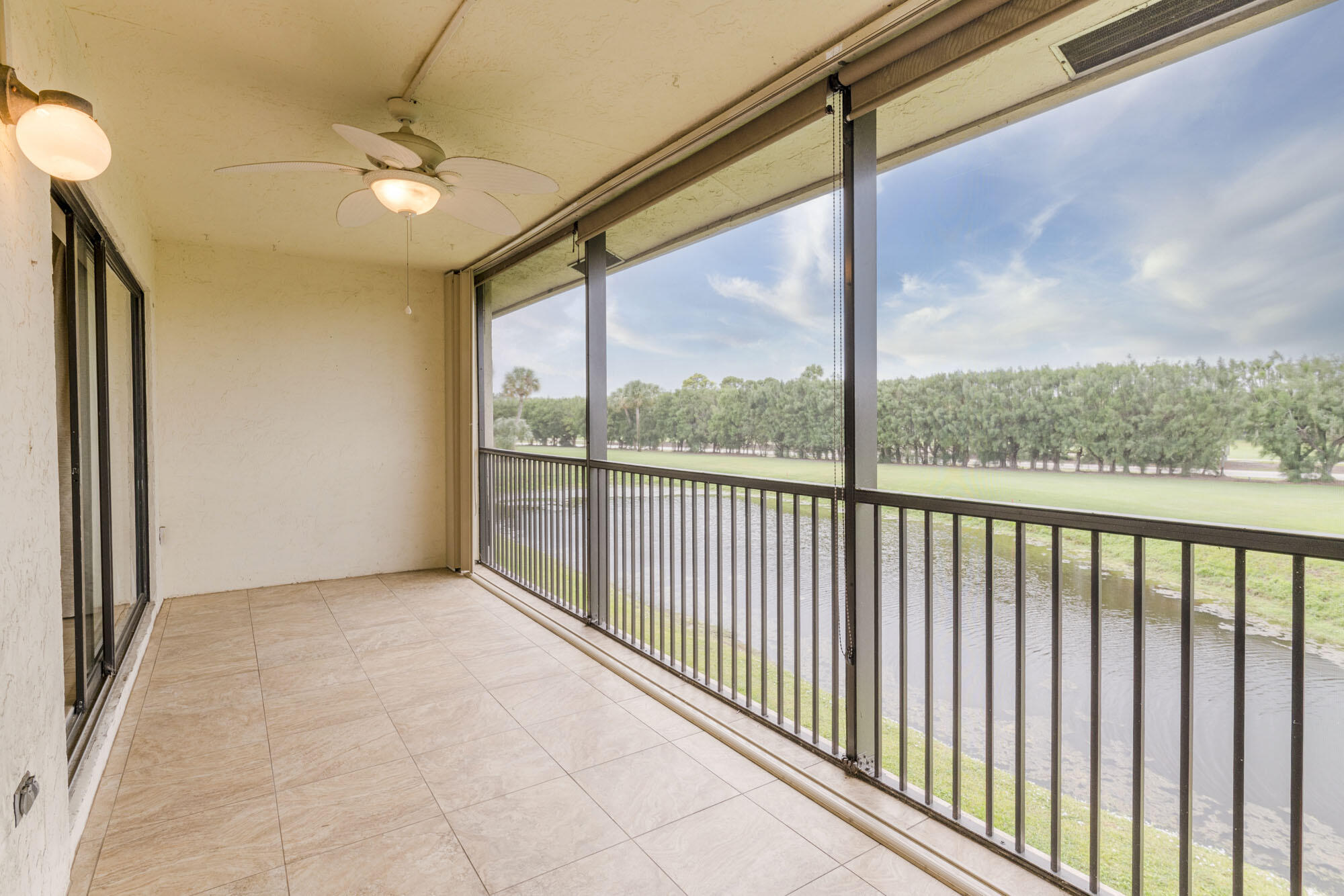 402 Pinecrest Circle, Unit D Jupiter, FL 33458 - Photo 2 of 18 Screen-enclosed Balcony