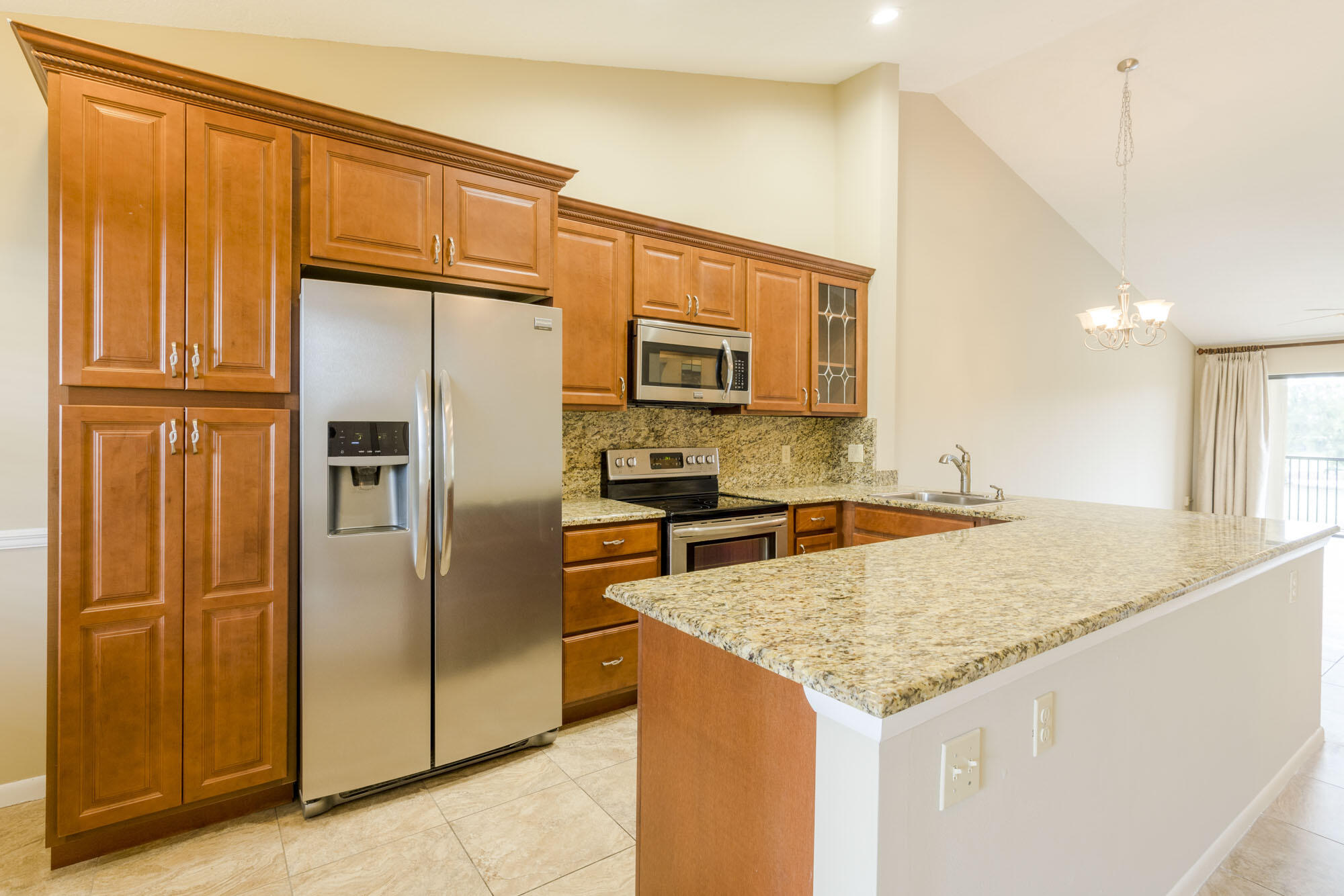 402 Pinecrest Circle, Unit D Jupiter, FL 33458 - Photo 5 of 18 Updated Kitchen