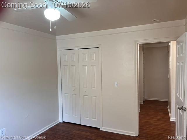 14682 Middle Gibraltar Road, Unit 24 Rockwood, MI 48173 - Photo 10 of 21 Double closets in each bedroom
Interior space featuring wood-finish flooring, white trim, and light neutral wall paint