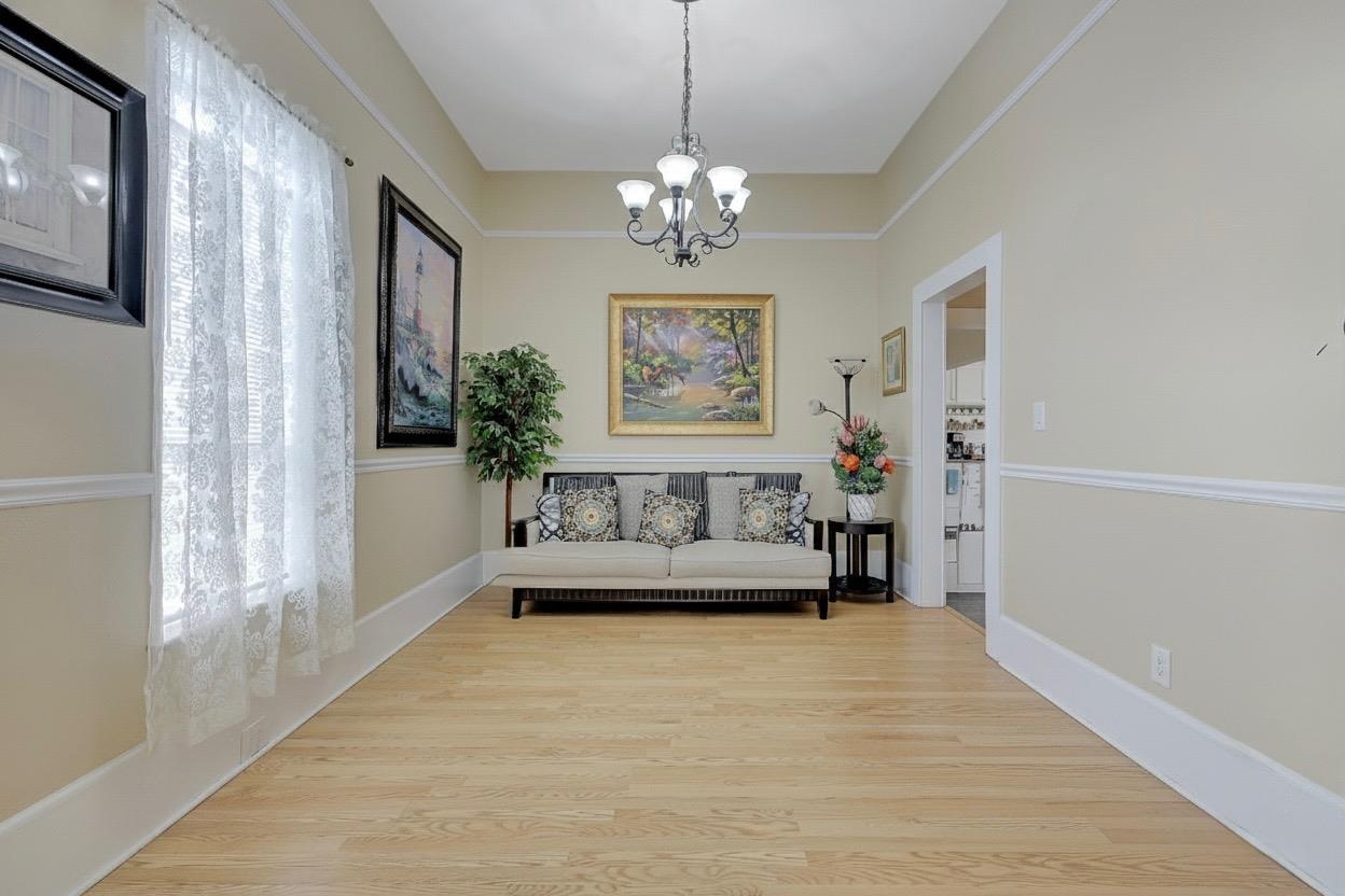 1408 Hazel Street Gridley, CA 95948 - Photo 18 of 60 a living room with furniture and a chandelier