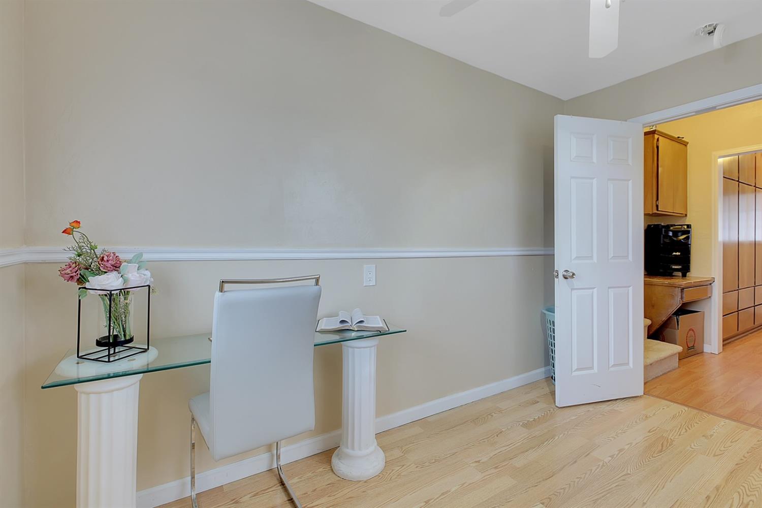 1408 Hazel Street Gridley, CA 95948 - Photo 25 of 60 a view of hallway with furniture and wooden floor