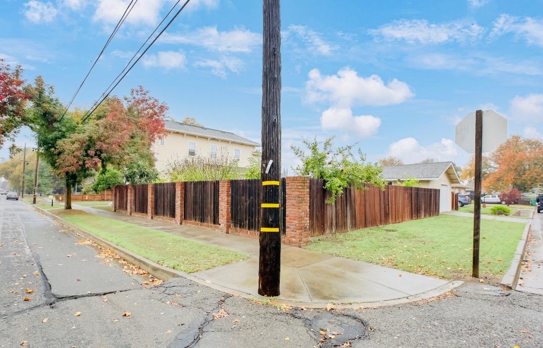 1408 Hazel Street Gridley, CA 95948 - Photo 5 of 60 a street sign on a sidewalk next to a road