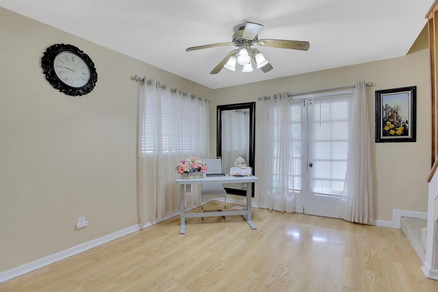1408 Hazel Street Gridley, CA 95948 - Photo 52 of 60 a living room with furniture and a chandelier
