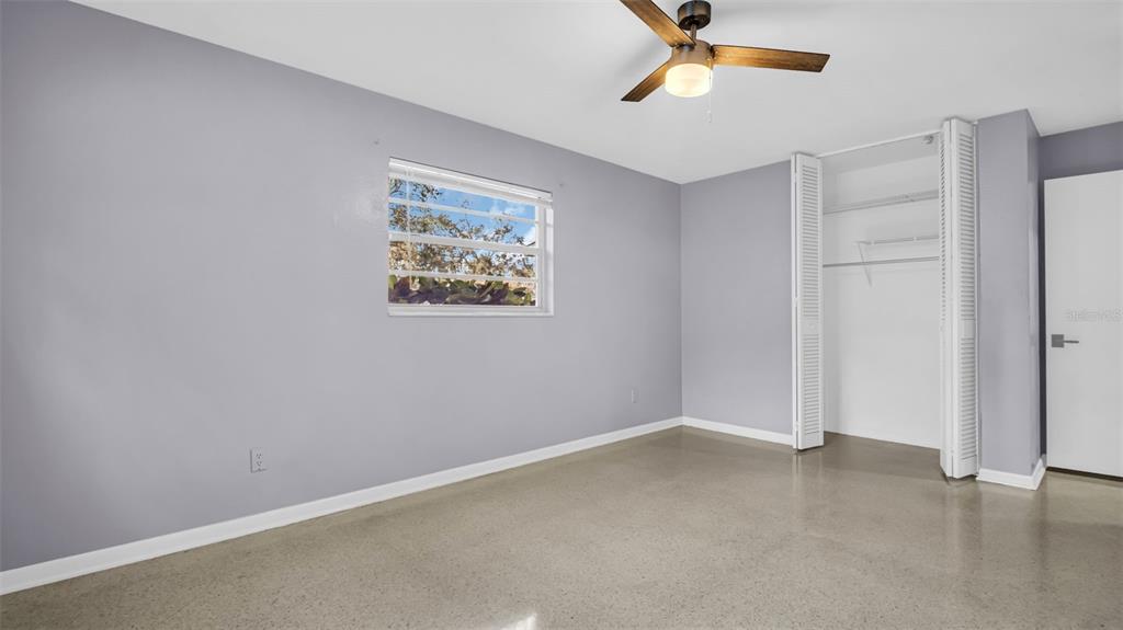 5831 Hillside Street Seminole, FL 33772 - Photo 11 of 26 a view of an empty room with a window