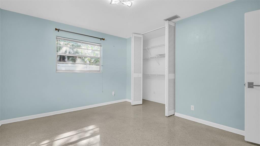 5831 Hillside Street Seminole, FL 33772 - Photo 15 of 26 a view of an empty room with a window
