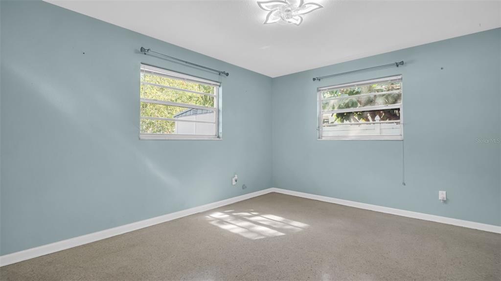 5831 Hillside Street Seminole, FL 33772 - Photo 16 of 26 a view of an empty room with a window