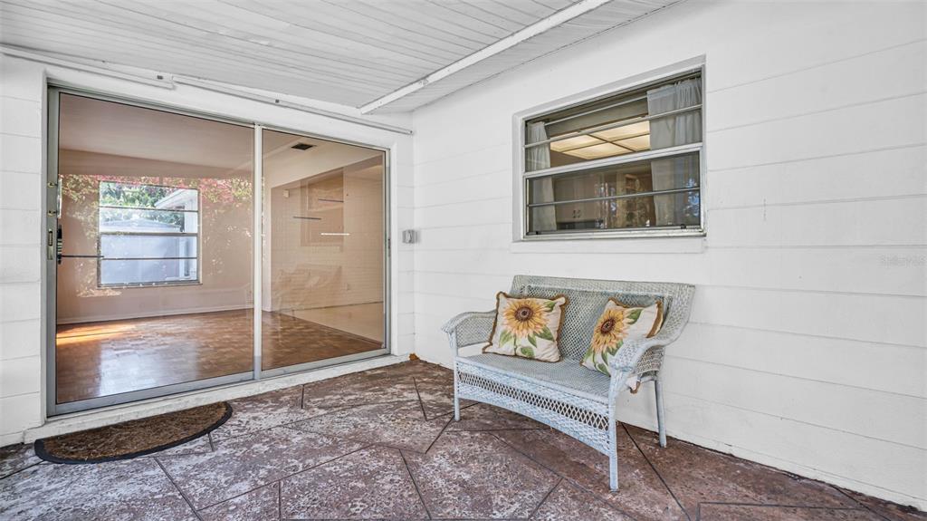 5831 Hillside Street Seminole, FL 33772 - Photo 18 of 26 a bench sitting in front of a building