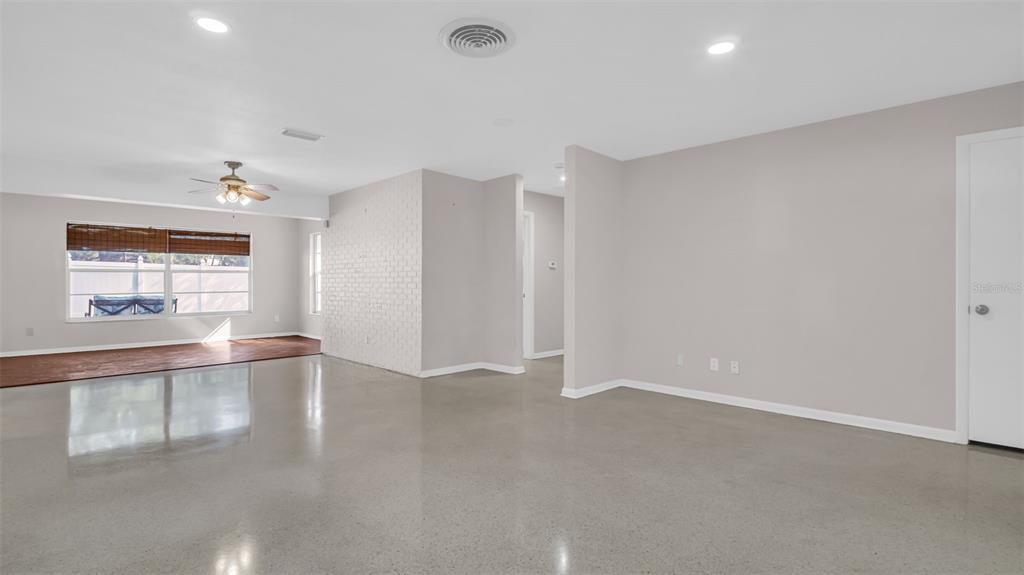 5831 Hillside Street Seminole, FL 33772 - Photo 6 of 26 a view of an empty room with a window