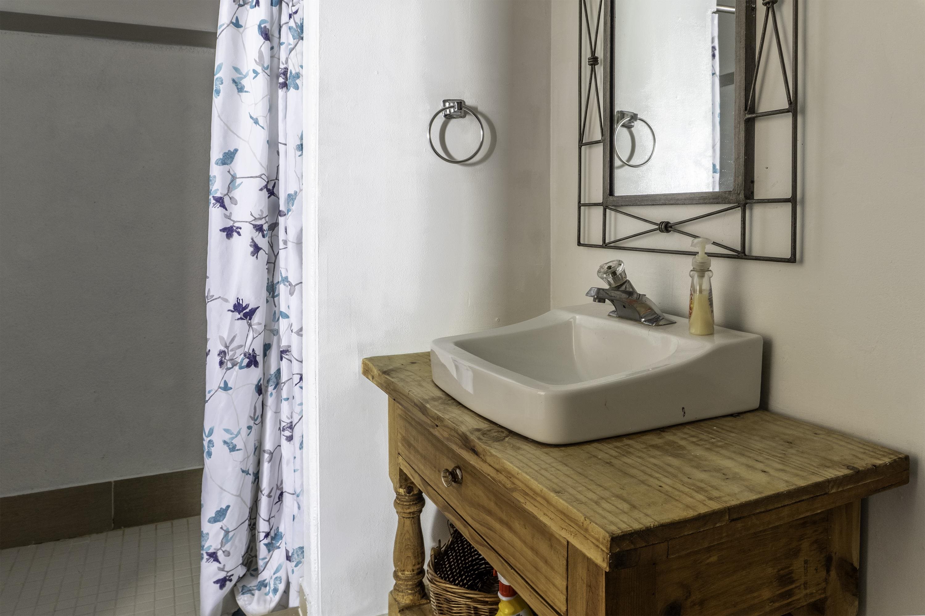 76 Alderman Street June Lake, CA 93529 - Photo 16 of 38 Full bathroom with a shower with shower curtain and vanity.