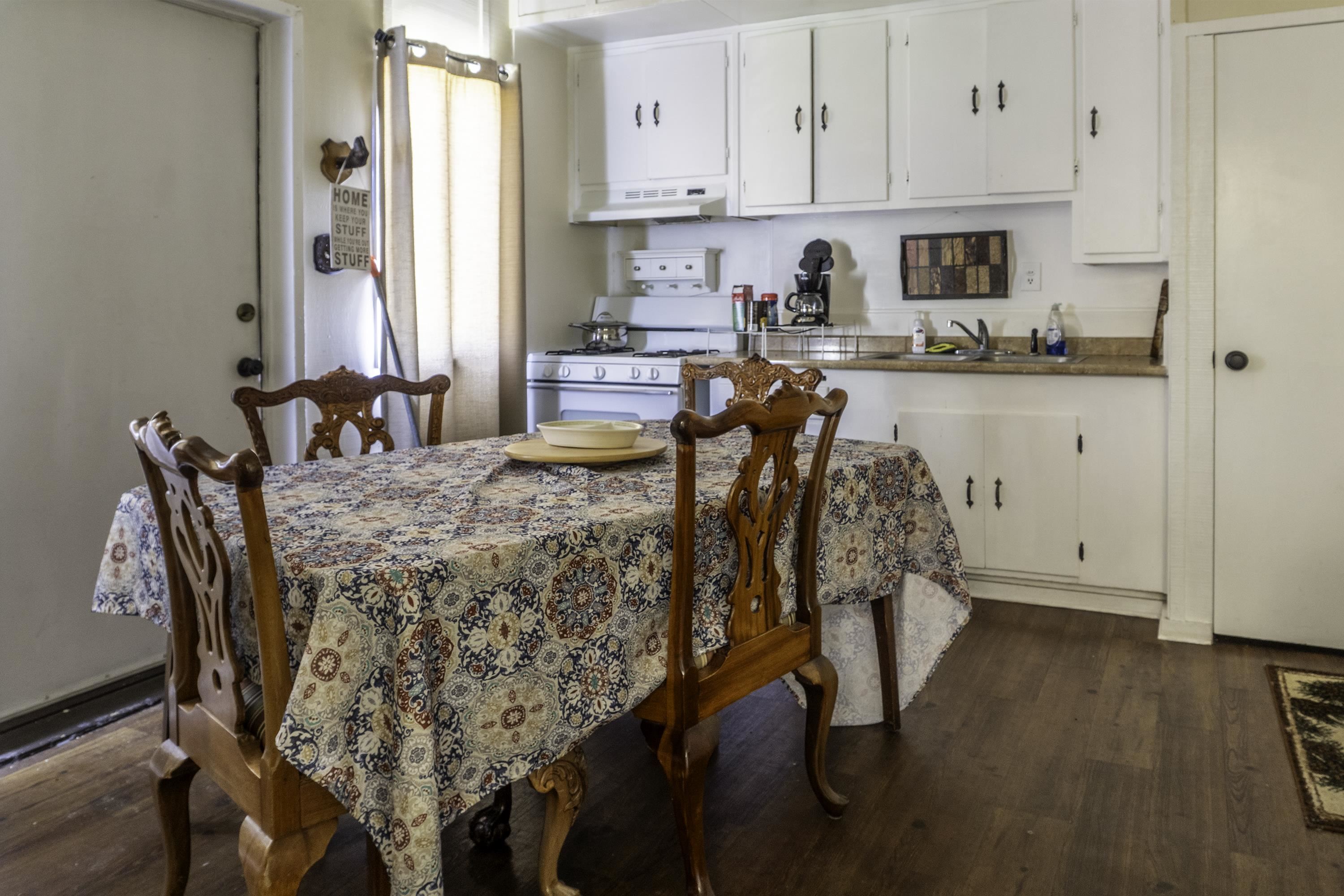 76 Alderman Street June Lake, CA 93529 - Photo 17 of 38 Dining space featuring dark wood-type flooring