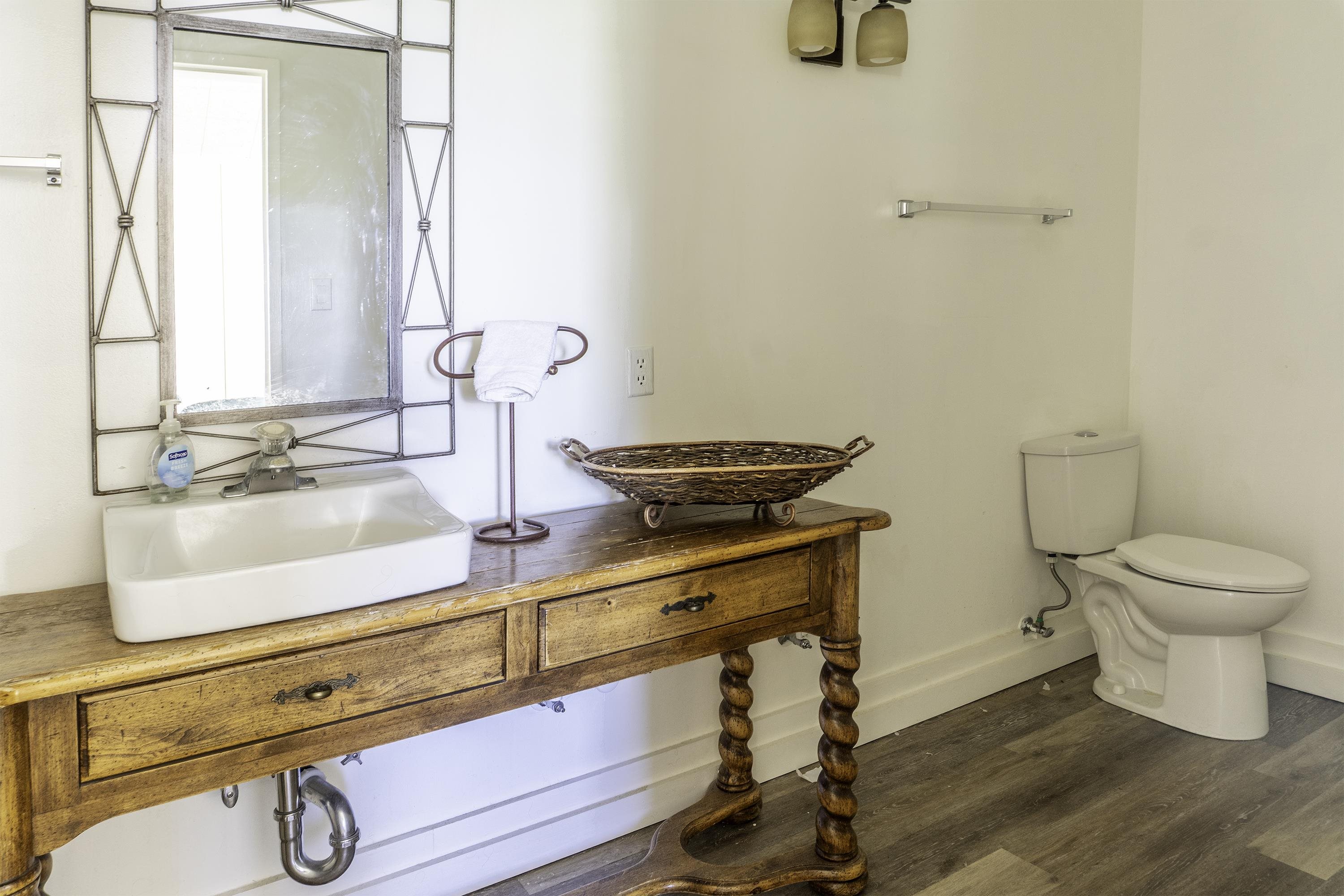 76 Alderman Street June Lake, CA 93529 - Photo 26 of 38 Bathroom featuring wood finished floors and vanity