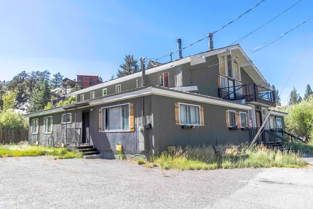 a front view of house with a yard