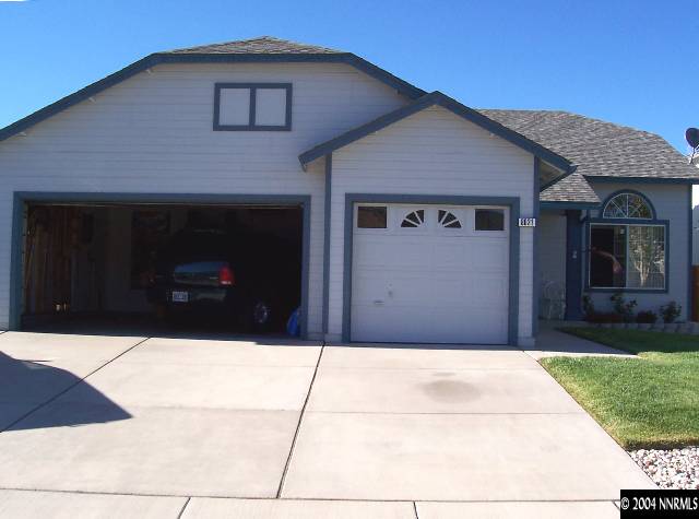 8021 Monterey Reno, NV 89506 - Photo 1 of 4 a front view of house with yard