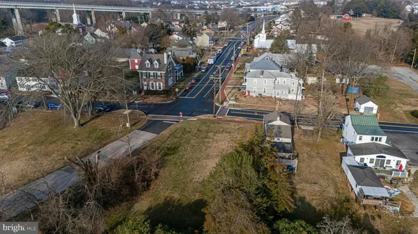 a view of houses with yard