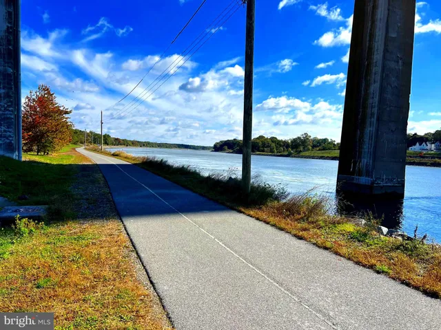 a view of swimming pool with outdoor seating