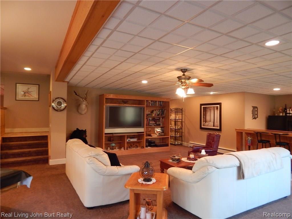 2651 Ray Road Oxford, MI 48370 - Photo 8 of 10 Built in Entertainment center with 64" TV
