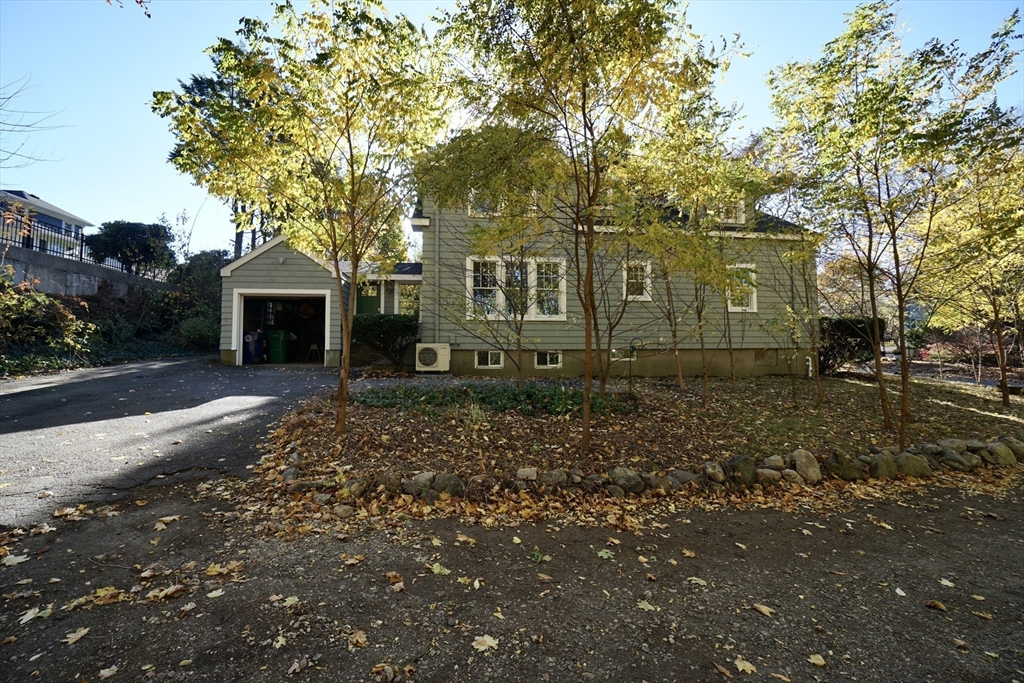 a view of a yard in front of a house
