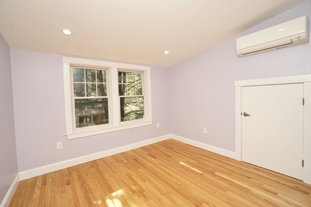 2 Thaxter Road Newton, MA 02460 - Photo 19 of 36 a view of an empty room with a window