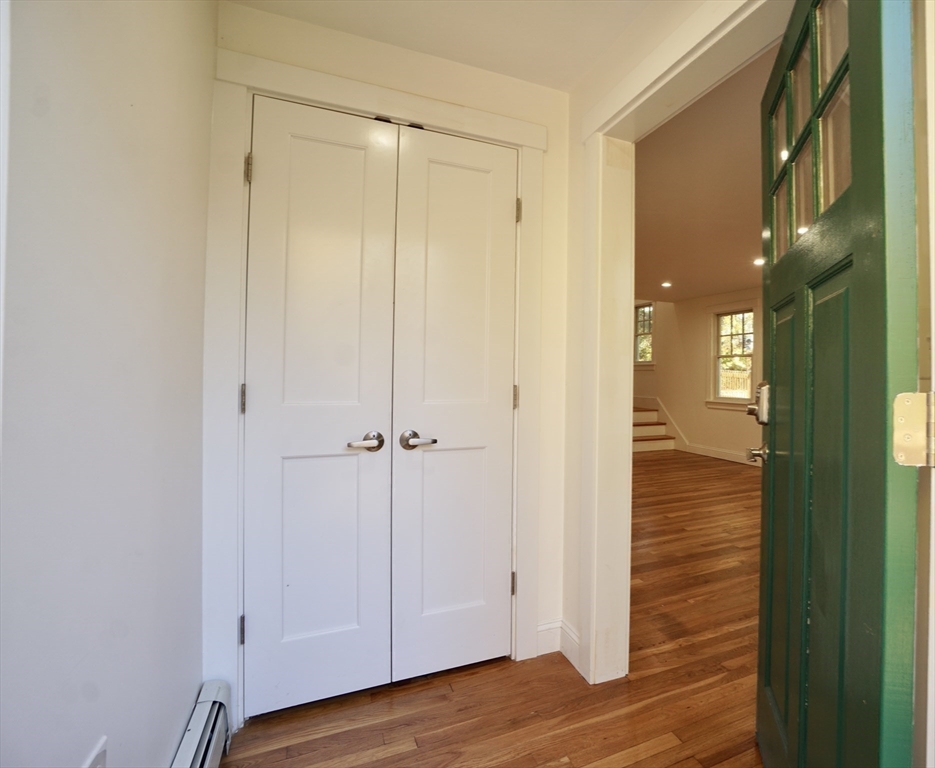 2 Thaxter Road Newton, MA 02460 - Photo 6 of 36 a view of a bathroom from the hallway
