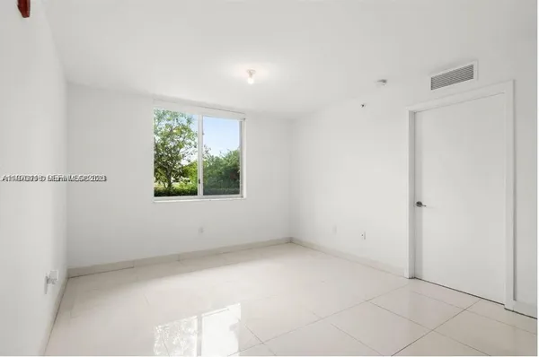 an empty room with a window